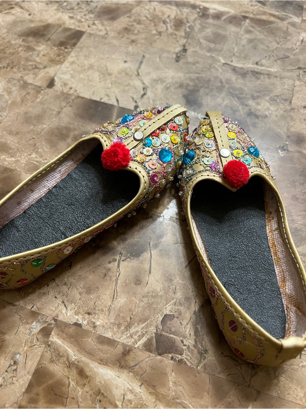 Embellished Gold kid Flats with Red Pom-Pom
